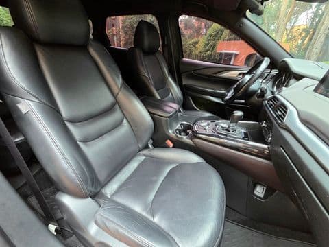 Mazda CX-9 2017 usado interior asientos cuero gris color panorámica desde puerta conductor